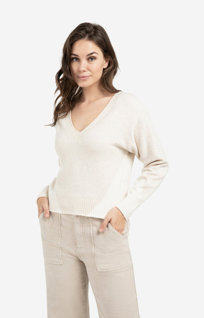 Knitted sweater with V-neck