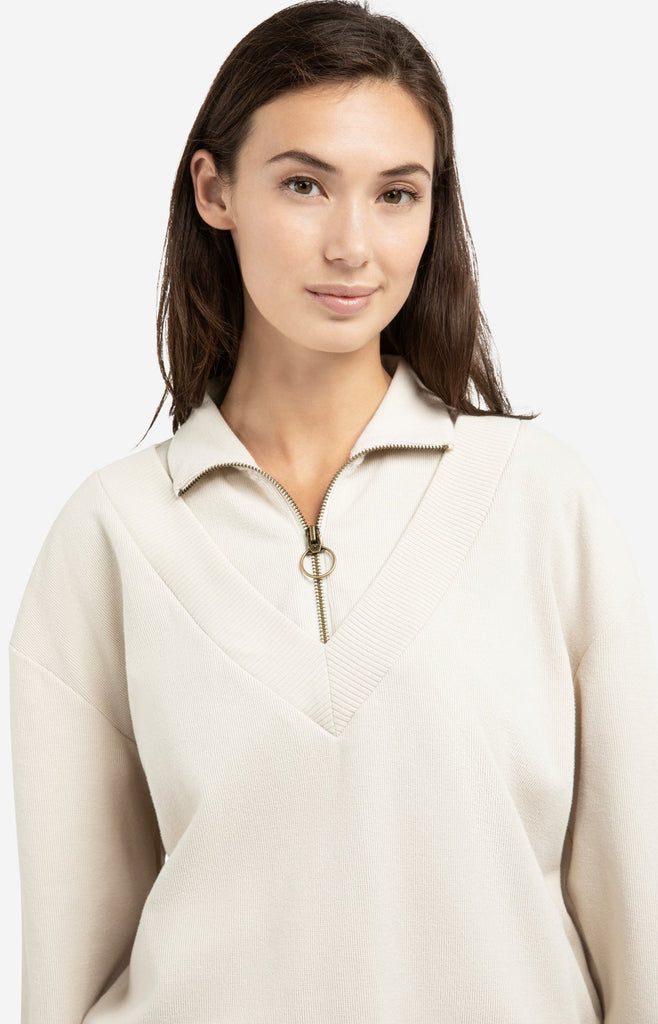 Sweater with half zipper